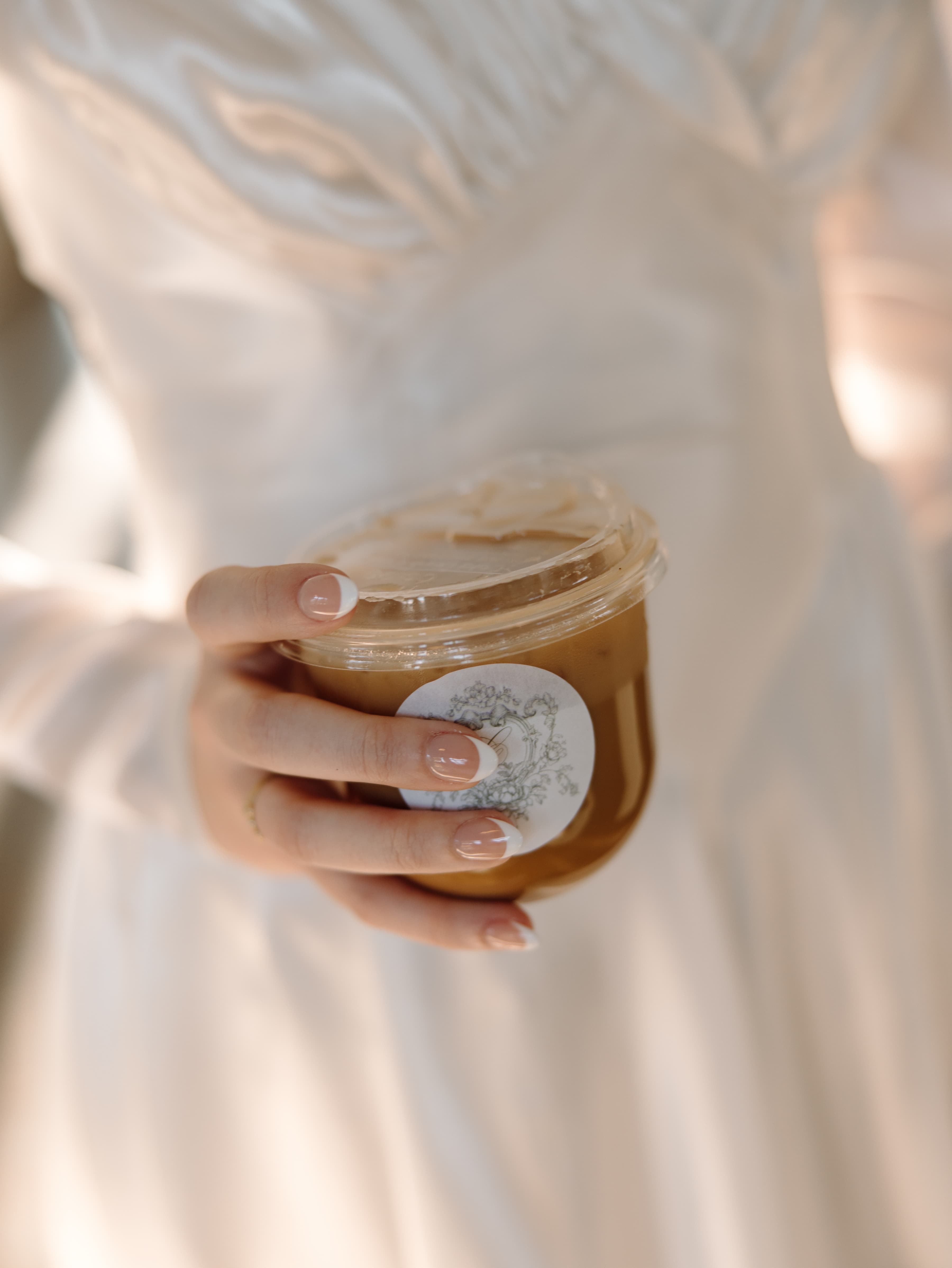 Freshly brewed latte with latte art from Giddy Up Coffee Co., Oklahoma’s premier mobile coffee catering service.